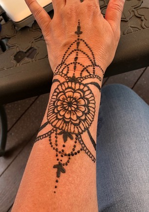 Henna Freshly Applied by Snappy Face Painting